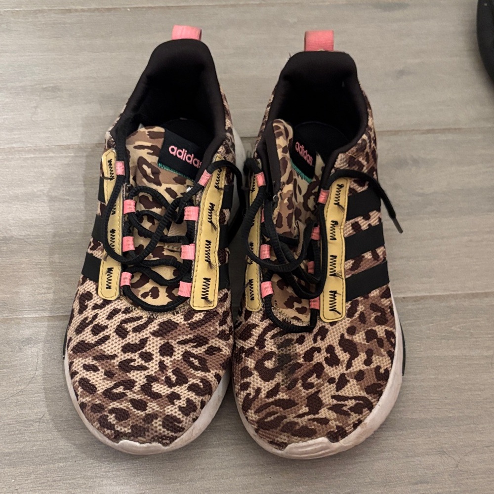 Adidas Leopard Print with pink and black accents. Gently used. Minimal wear.